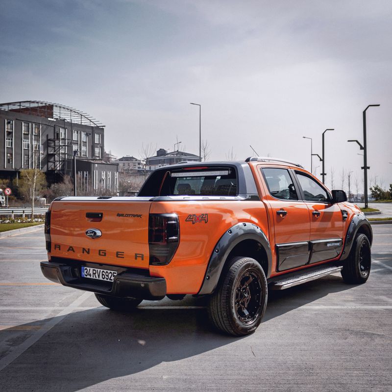 Orange Ford Ranger in City · Free Stock Photo