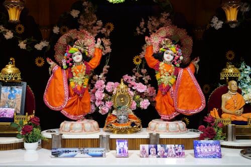 Colorful Figures and Flowers in a Temple 