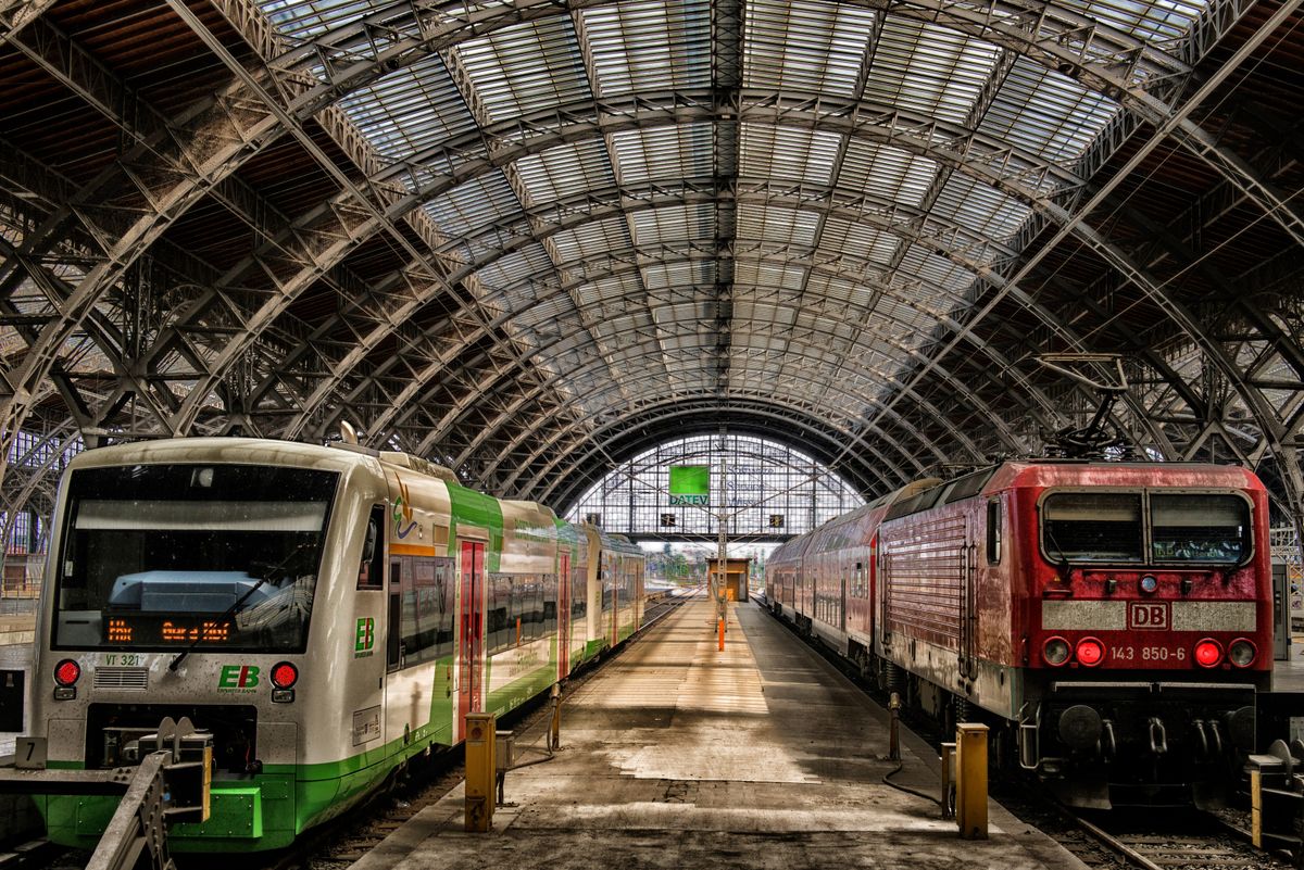 Trains on both sides of a station platform in Leipzig, Germany