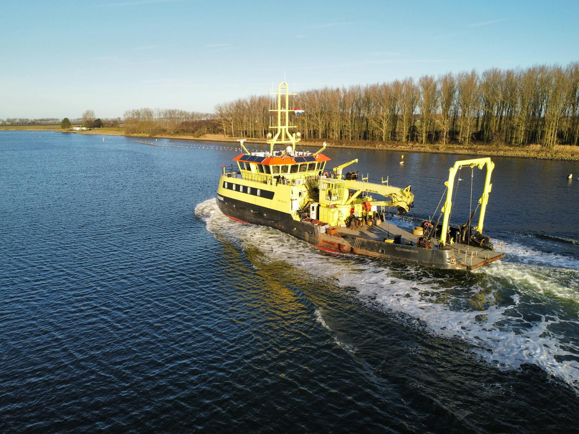 A Research Vessel Sailing on a River