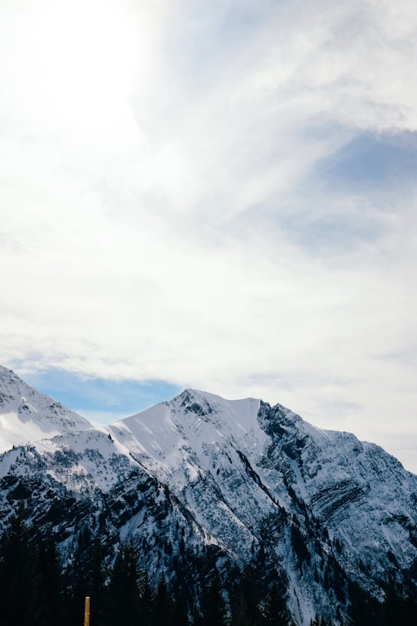 Grayscale Photo Of Snowcapped Mountain · Free Stock Photo