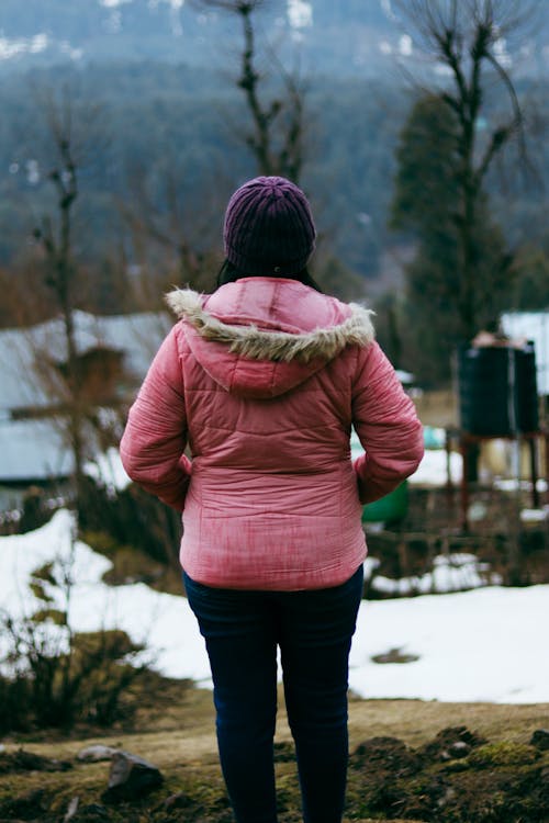 Back View of Woman in Pink Jacket