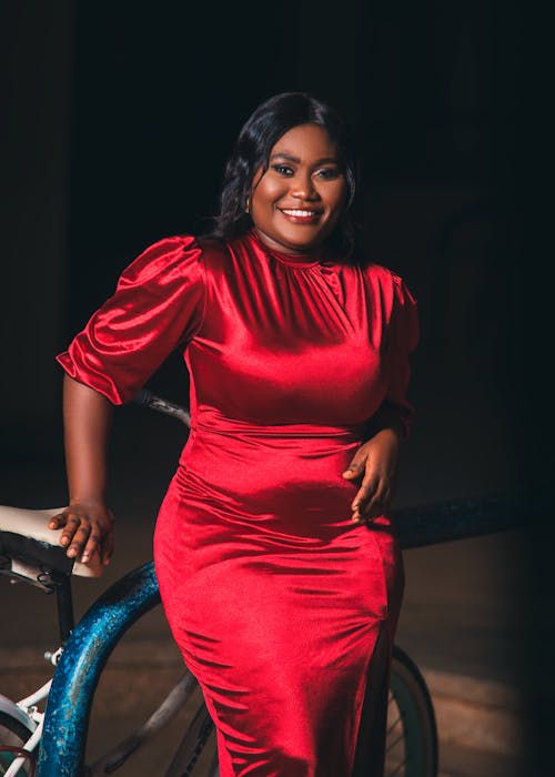 Woman Posing in Red Dress