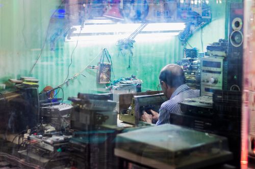 Free Radio repairman street photography  Stock Photo