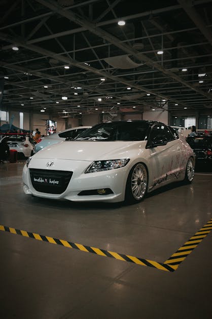 A White Honda CR-Z at a Car Exhibition · Free Stock Photo