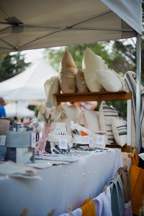 Free Market Stall with Bedding and Towels Stock Photo