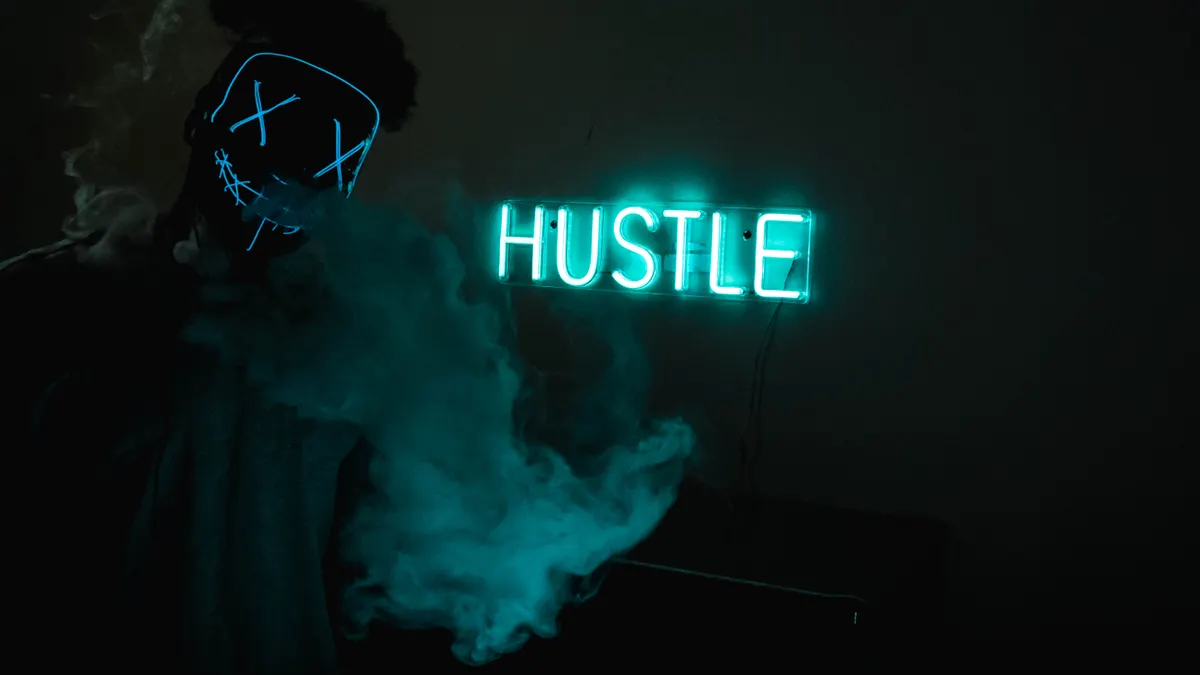 Ignite Your Ambition with a Vibrant 'Hustle' Neon Sign