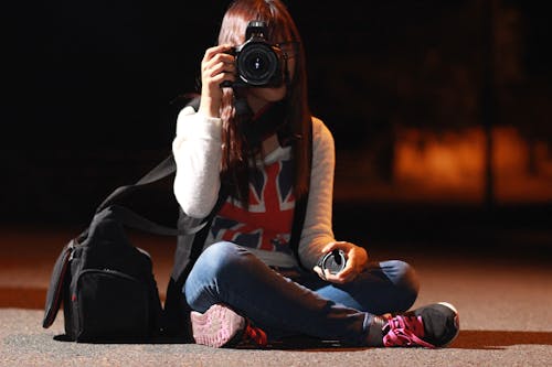 Woman in White Long Sleeve Shirt Taking Picture during Nightie