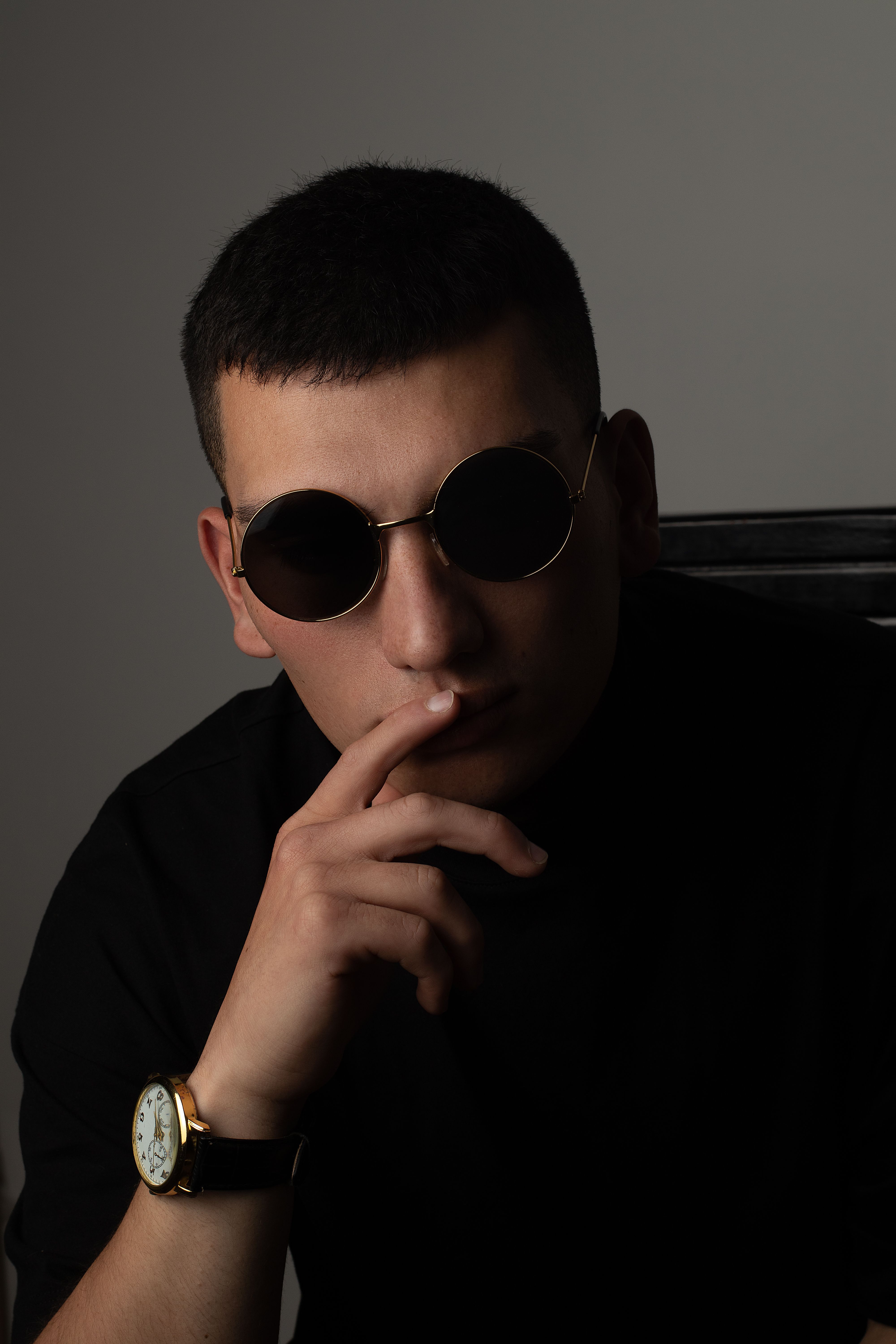 Studio Shot of a Young Man Wearing Sunglasses · Free Stock Photo