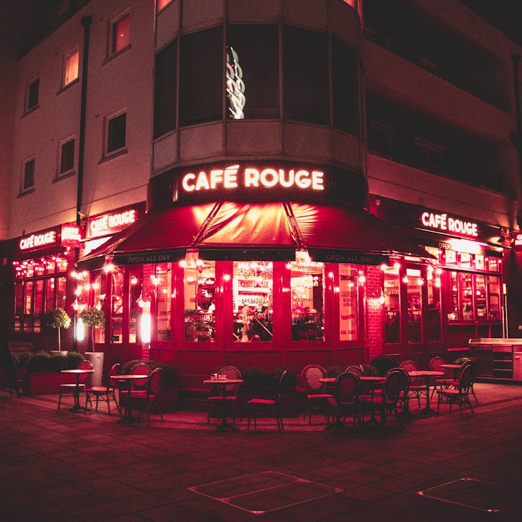 Gray Building With Cafe Rouge Led Signage