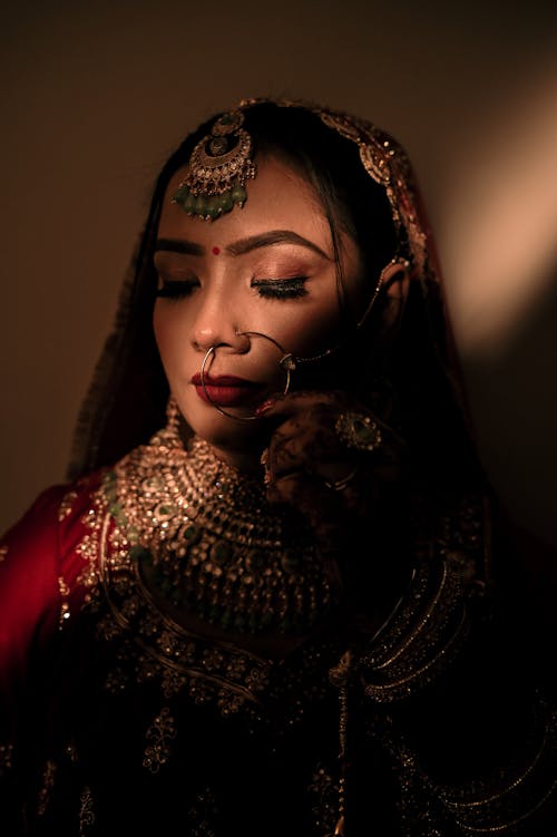Young Woman in a Traditional Indian Wedding Outfit 