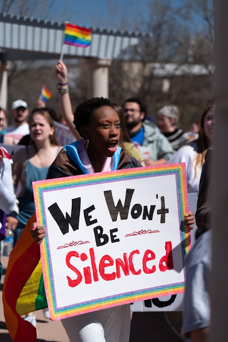 Woman With Banner At Demonstration