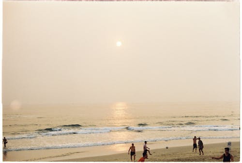Foto stok gratis lautan, manusia, matahari