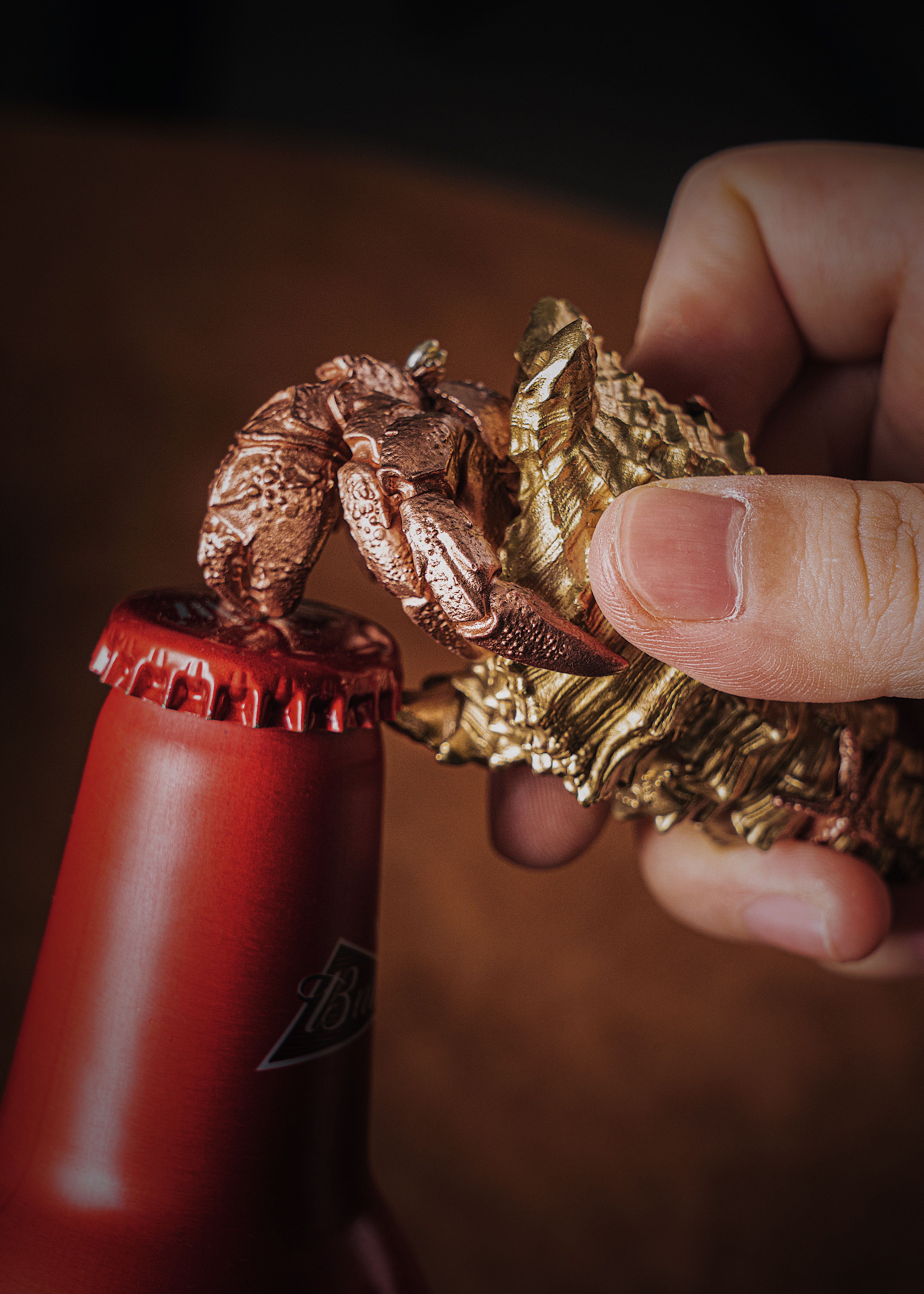Opening Bottle with Crab Cap Opener · Free Stock Photo