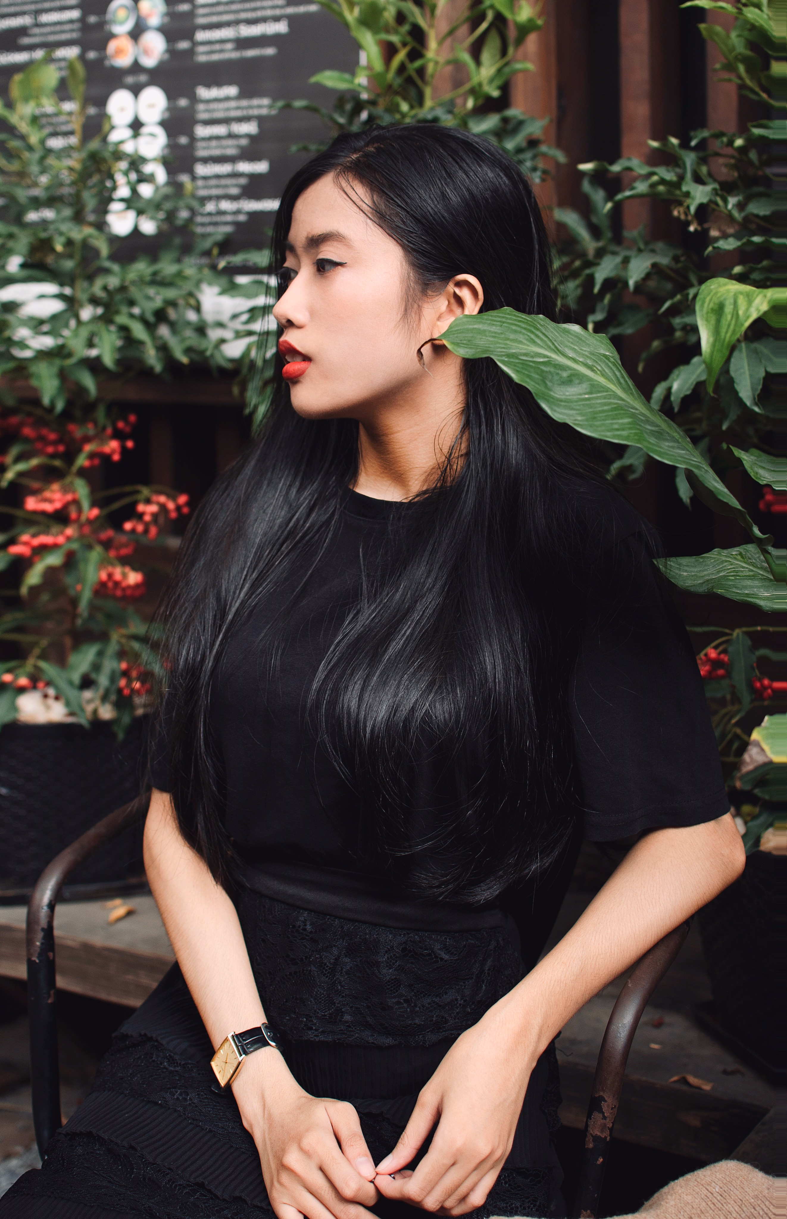 Woman with Black Hair Posing in Black Clothes · Free Stock Photo