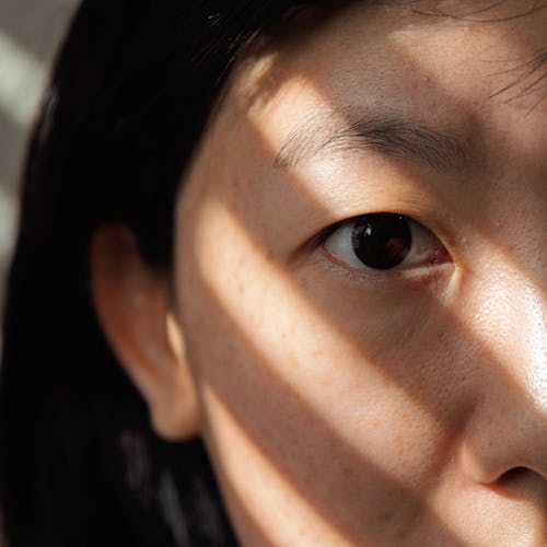 A Close-up of Womens Eye in the Sunlight