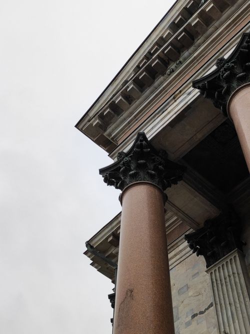 Free Low angle view of classical columns at Saint Isaac's Cathedral, showcasing detailed craftsmanship. Stock Photo