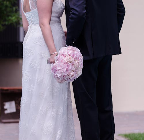 Person Holding Pink Rose Bouquet