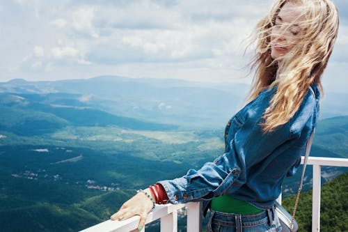 Free Woman in Blue Shirt Sightseeing Stock Photo