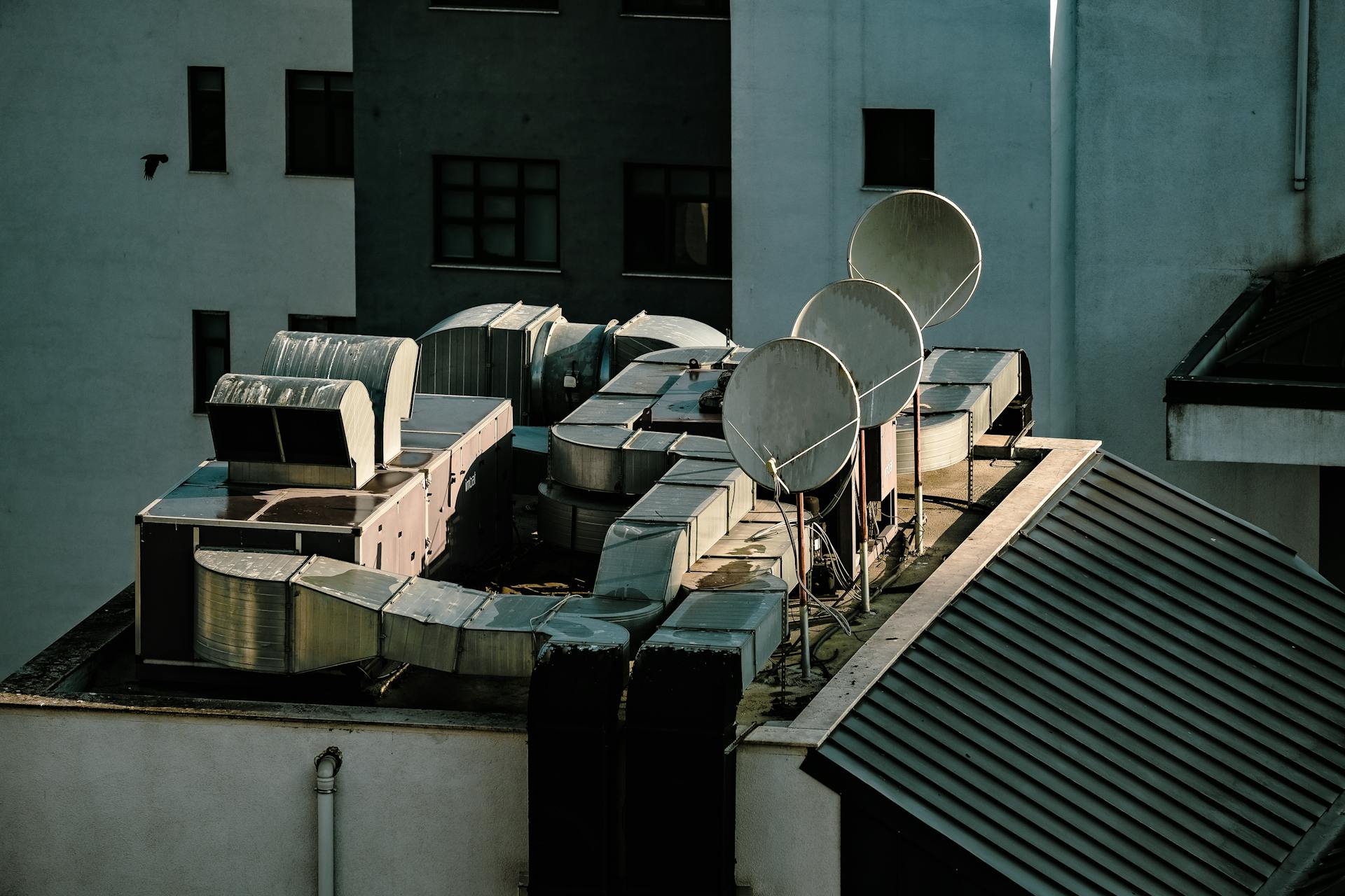 Pipes and Antennas on Building Roof