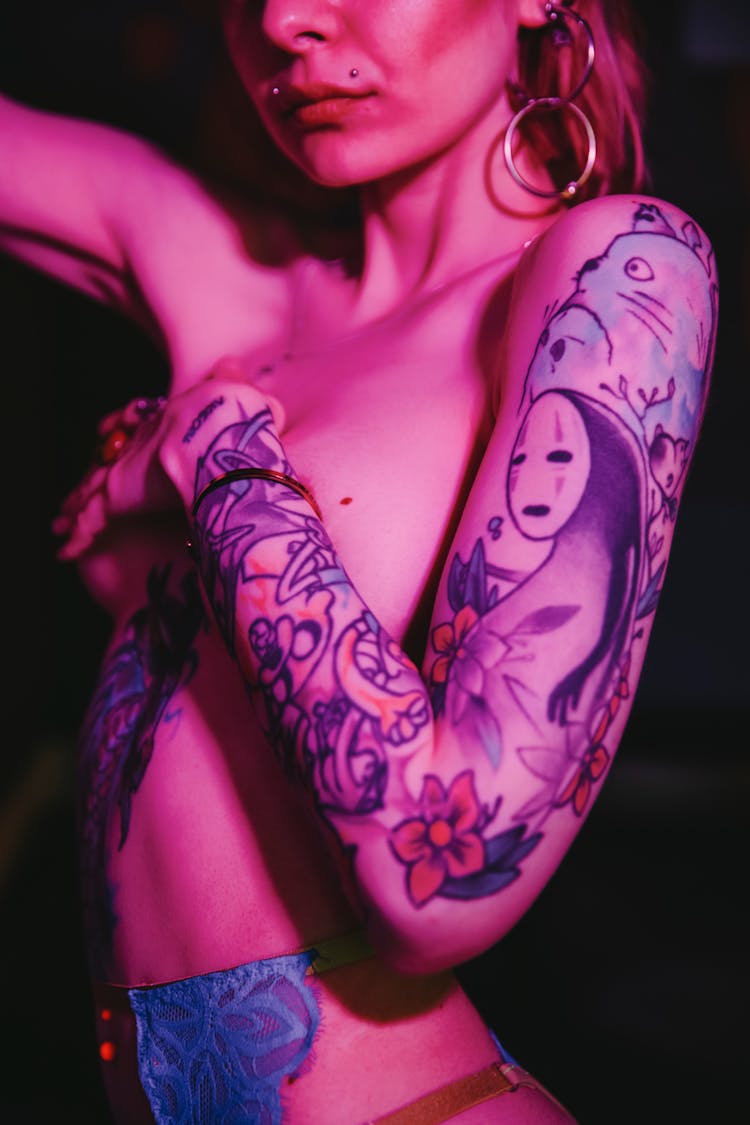 Close Up Of Naked Woman With Tattoos