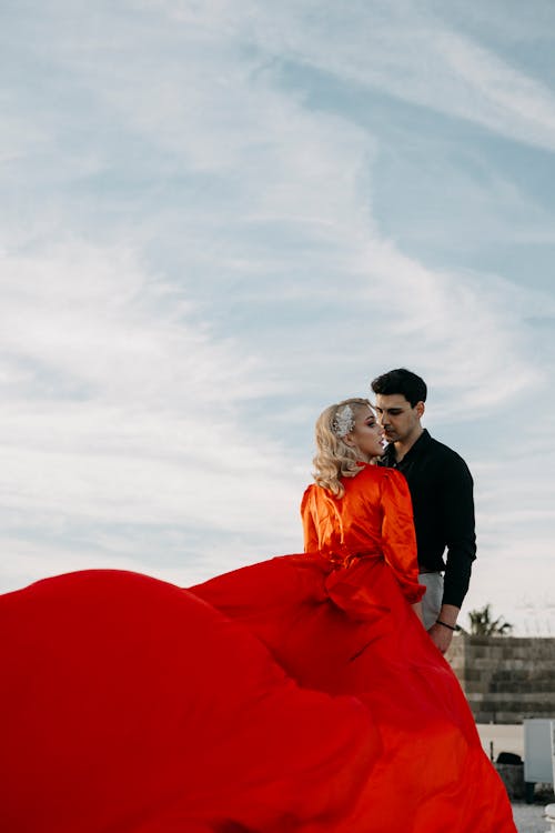 Man with Woman in Red Dress