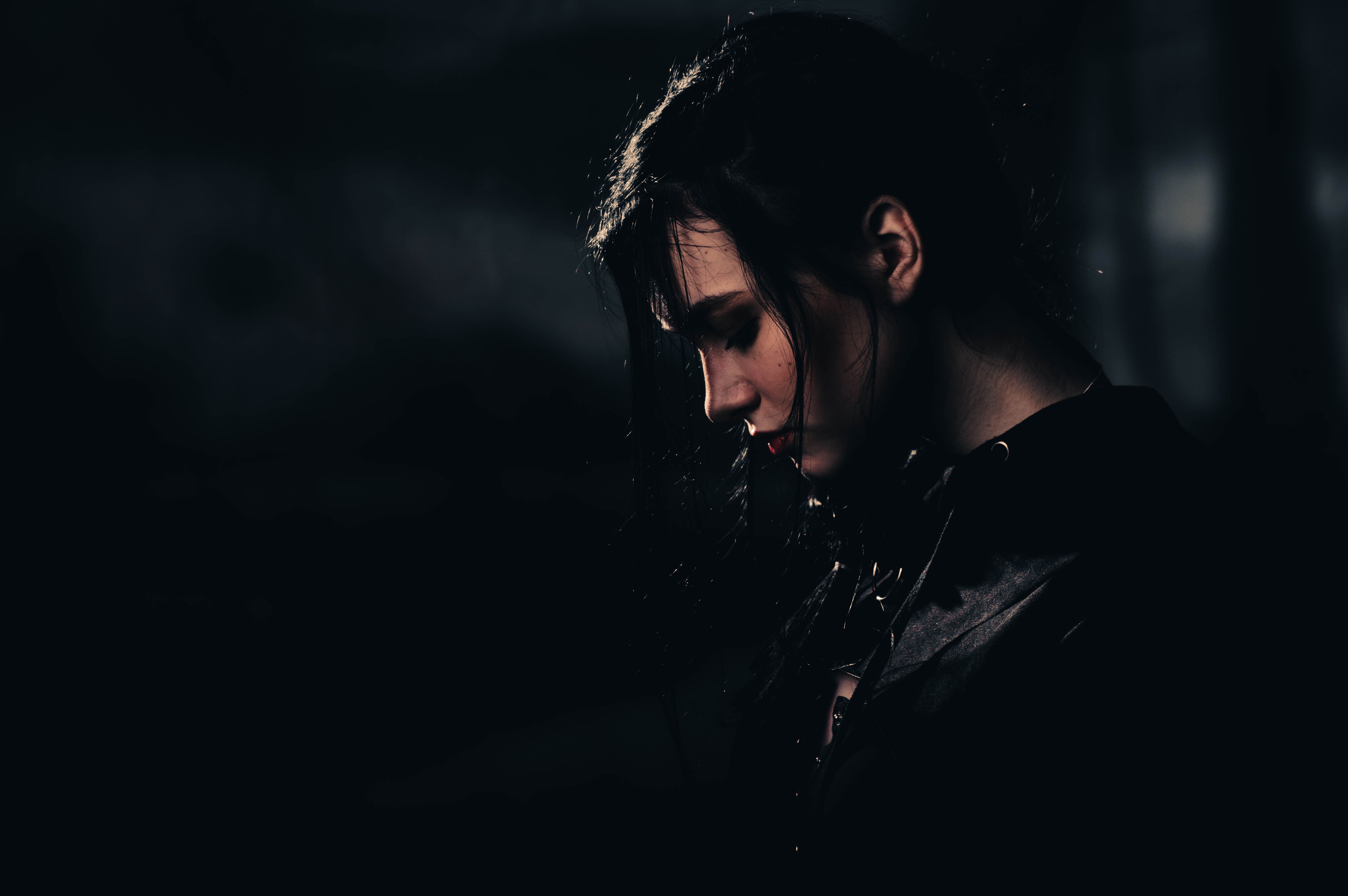 Photo of Woman in Dark Room · Free Stock Photo