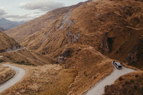 Free Explore the winding roads and dramatic landscapes of Coronet Peak, Otago, New Zealand, perfect for travel enthusiasts. Stock Photo