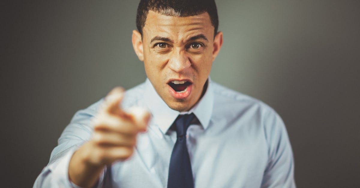 Man Wearing White Dress Shirt With Black Necktie