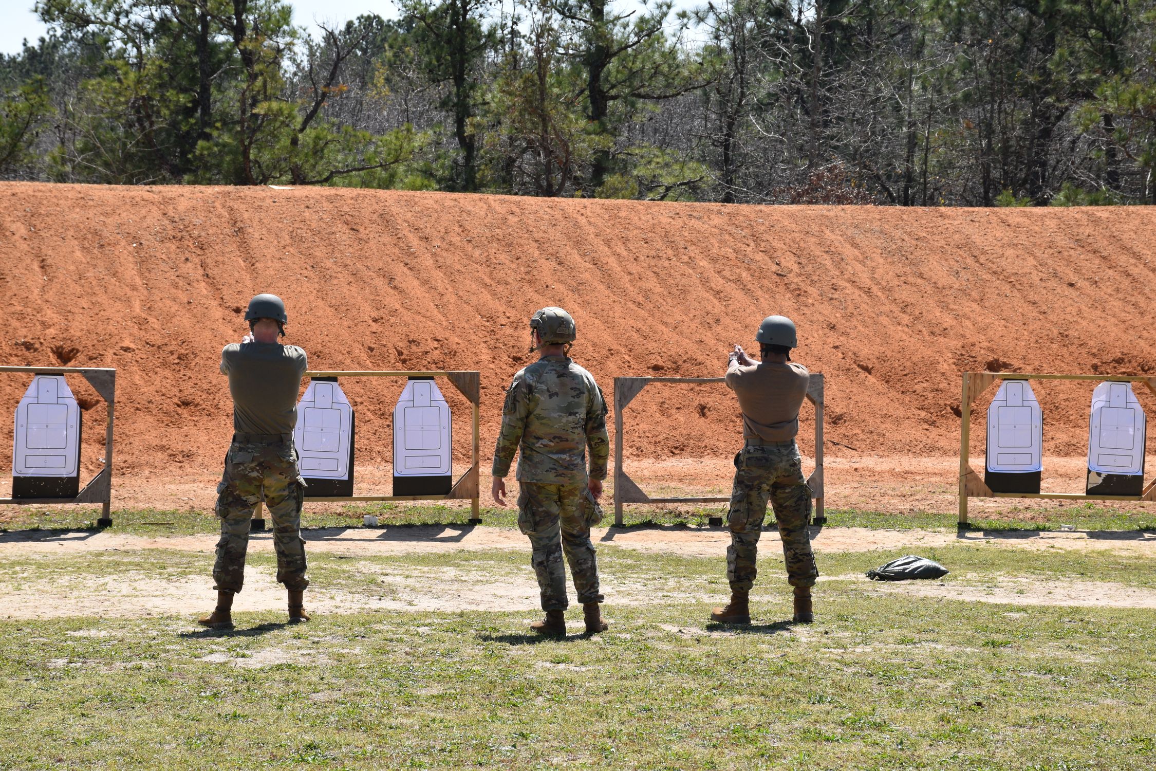Heals Rifle Range Men Shooting on the Riffle Range · Free Stock Photo