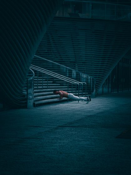Athlete training on stadium stairs, photo by Shane West on Pexels