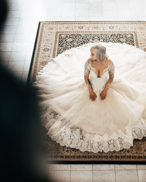 Woman Wearing White Sweetheart Neckline Wedding Dress 
