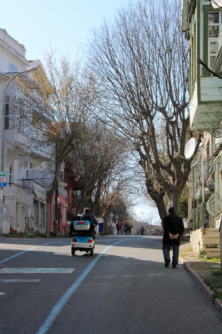 Old People Walking On Street