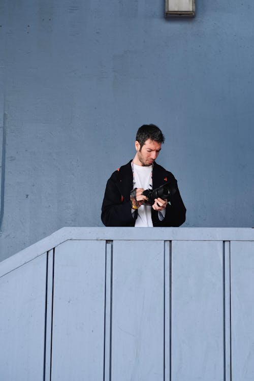 Man Standing on Stairs