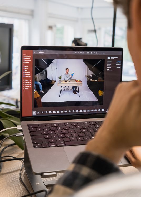 Man Editing a Video on a Laptop · Free Stock Photo