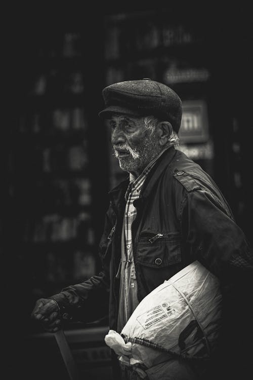 Elderly Man with Bag