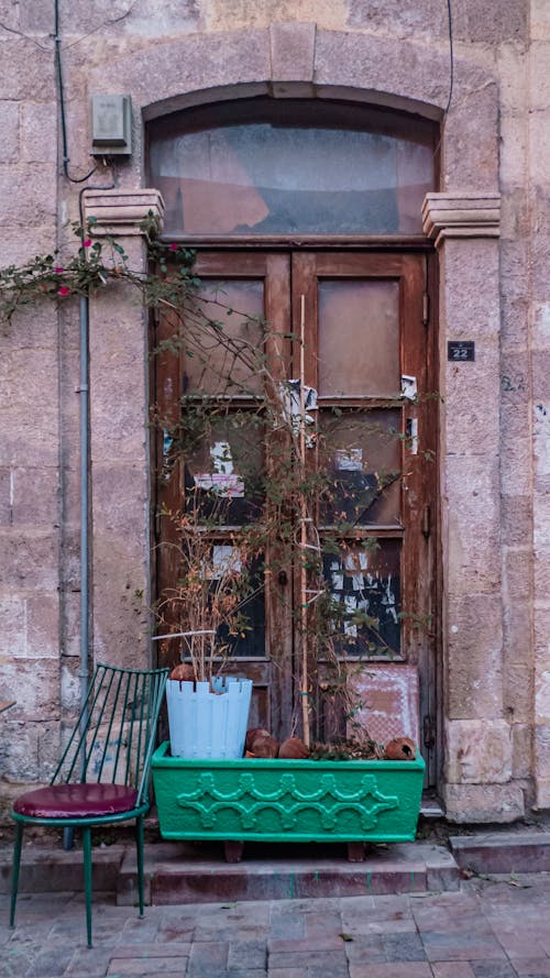 Free Photo of an Entrance Covered with Pots Stock Photo