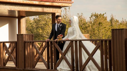 Smiling Newlyweds Standing Together