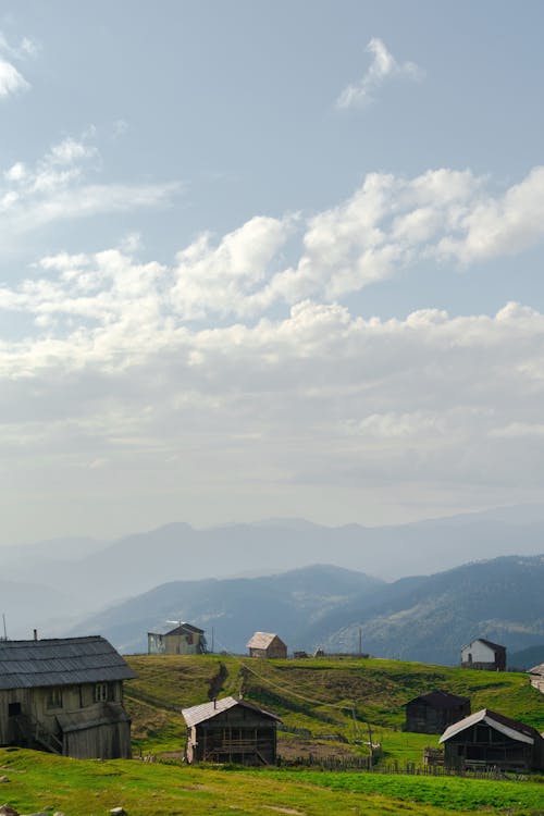 Foto d'estoc gratuïta de cases, muntanyes, paisatge