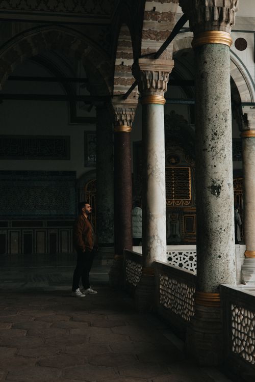 Man Standing Near Building · Free Stock Photo