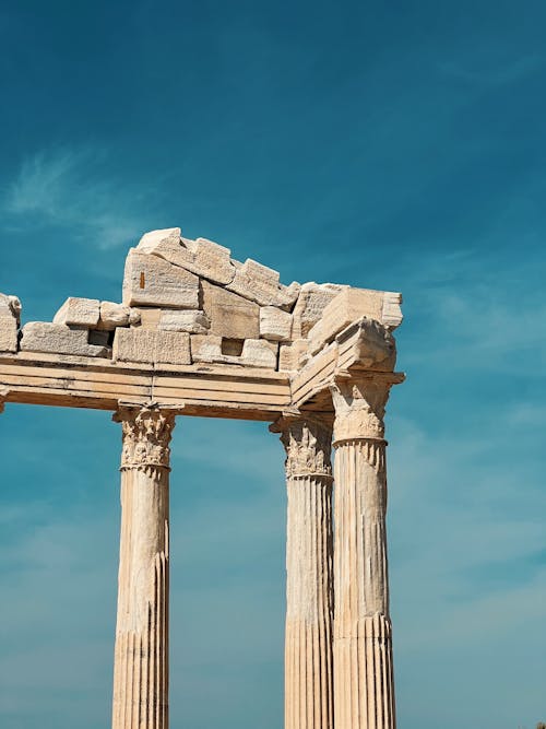 Part of the Apollon Temple on the Background of a Clear Blue Sky 