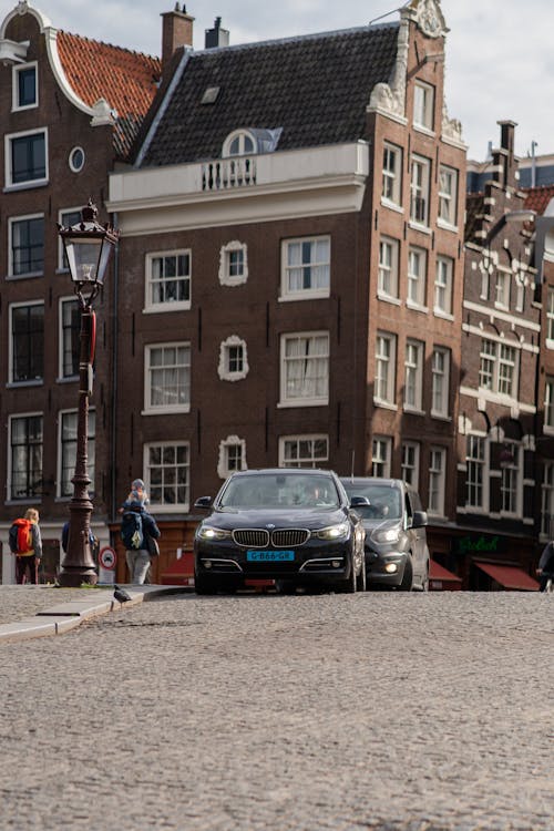 BMW, 거리, 건물의 무료 스톡 사진