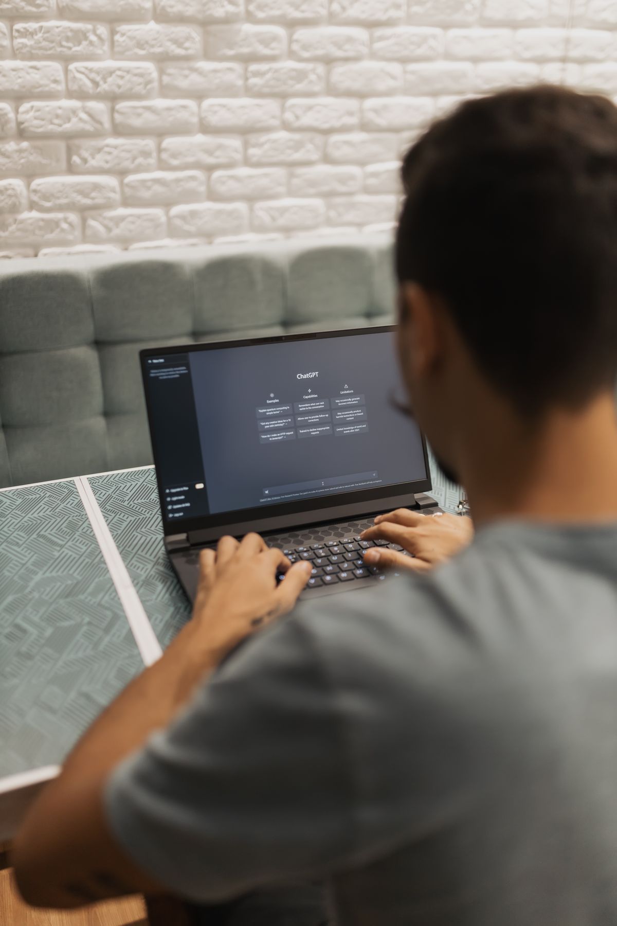 Man using ChatGPT AI system on laptop representing AI's unfair advantage for online income