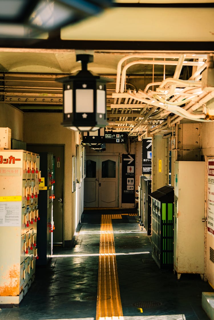 Pipes On Ceiling Of Corridor In Hospital