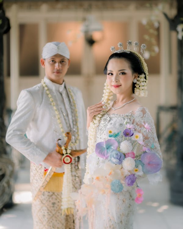 Wedding Portrait of a Young Couple in Traditional Javanese Clothes ...