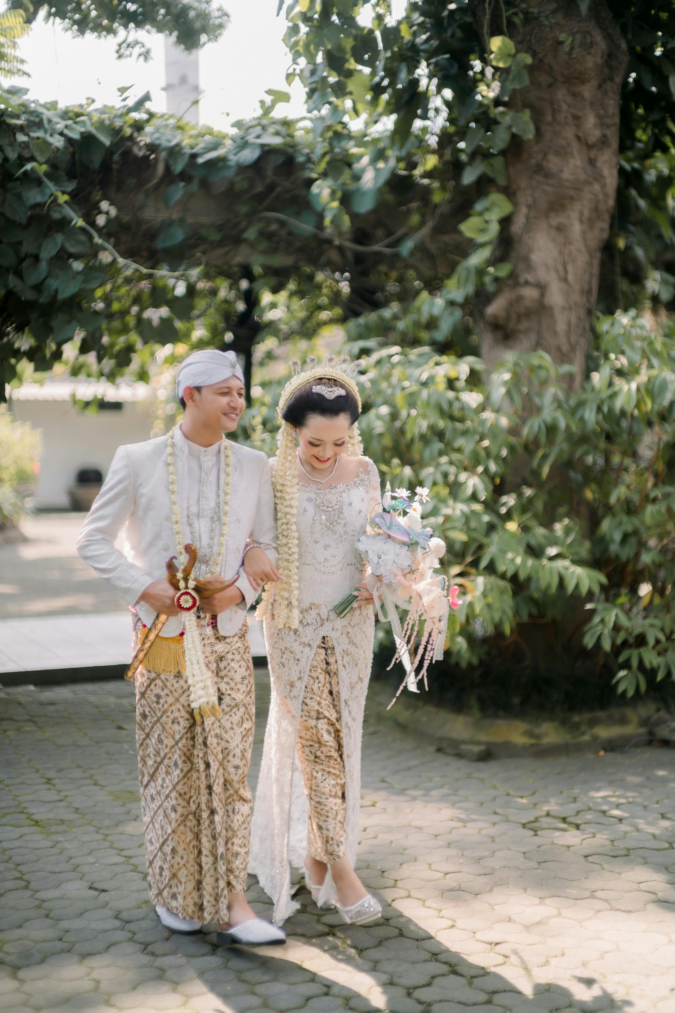 couple in traditional javanese wedding clothes
