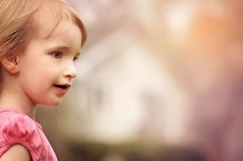 Free Close Up Photo of Girl in Pink Shirt Stock Photo