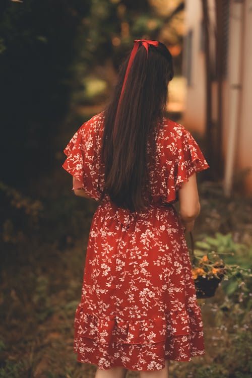 Back View of Woman in Red Dress
