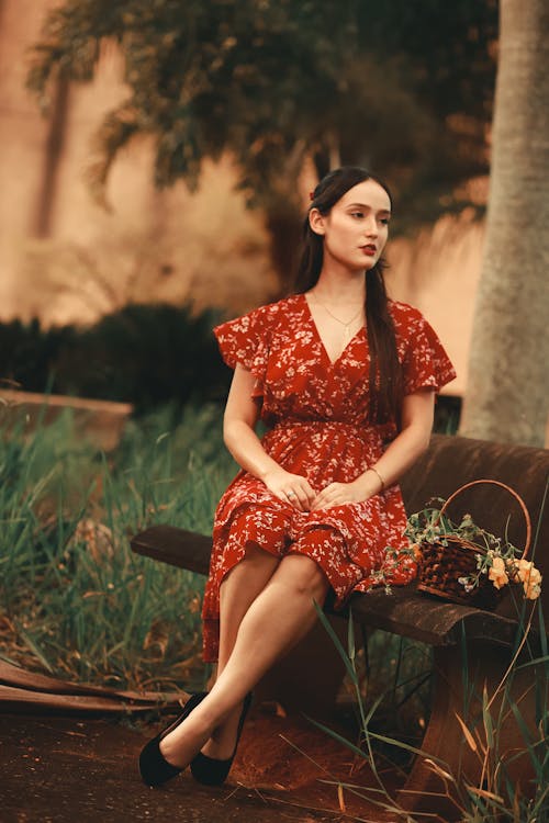 Sitting Woman in Red Dress