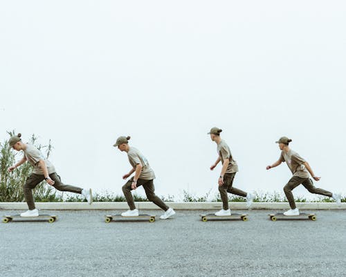 Free Men Skateboarding on Street Stock Photo